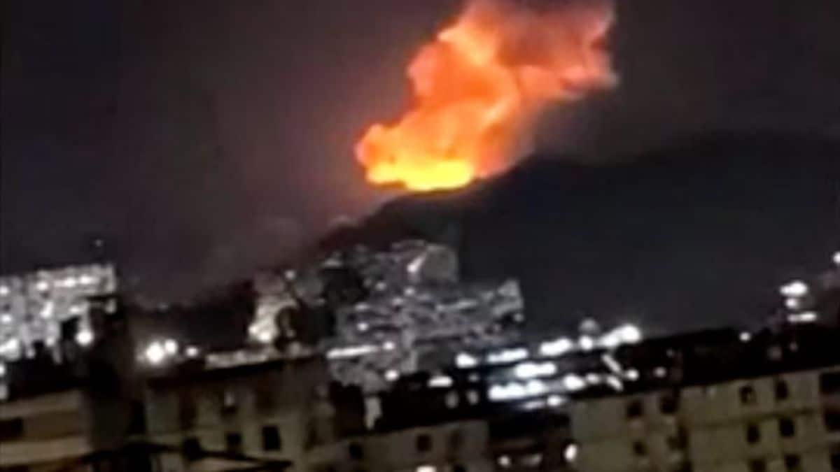 Videos of multiple explosions in Venezuela’s capital surface as residents report low-flying aircraft