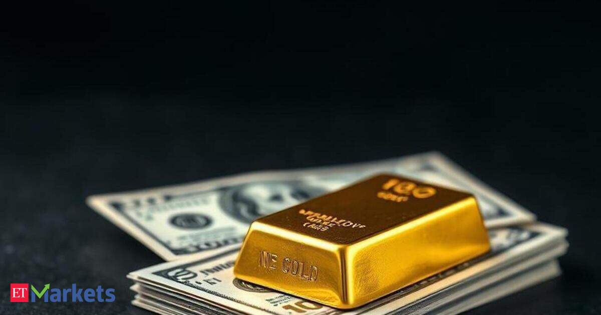 Gold dips as dollar ticks up; all eyes on inflation data