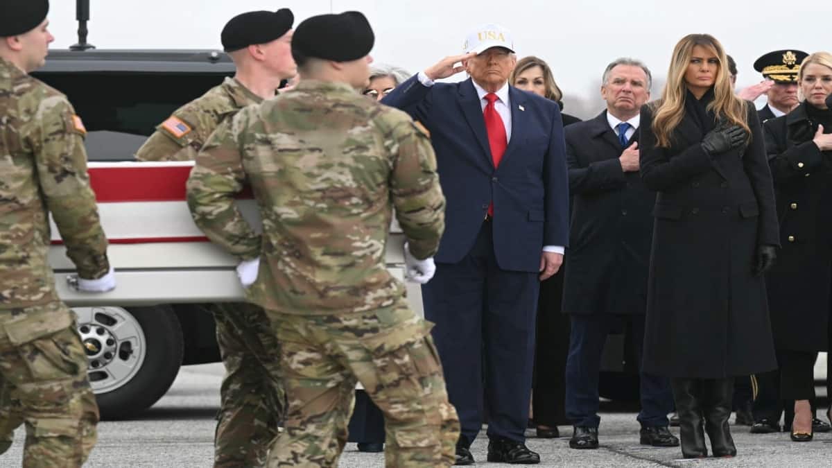 With a ‘USA’ cap on his head, Trump attends return of first US troops killed in Iran war