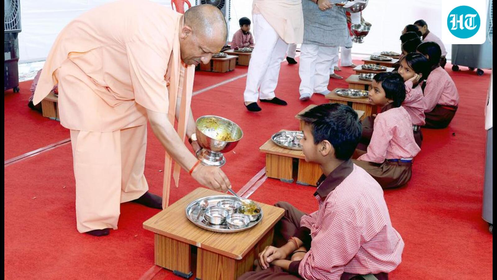 School Chalo Abhiyan: Yogi serves mid-day meal, tells children to attend school regularly