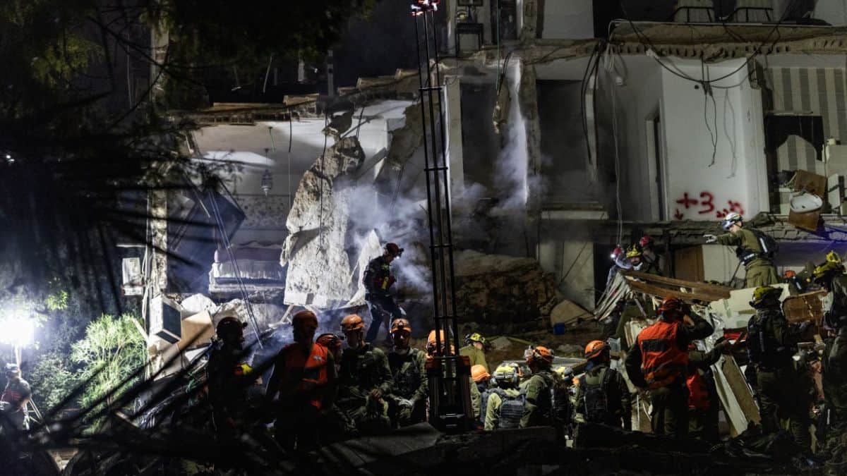 Iranian missile hits building in Israel, leaving people missing under rubble